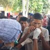 Migrantes se cosen la boca durante protesta en Chiapas