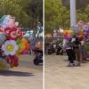 VIDEO: Vendedora de globos sufre por los fuertes vientos y todo termina en un drama