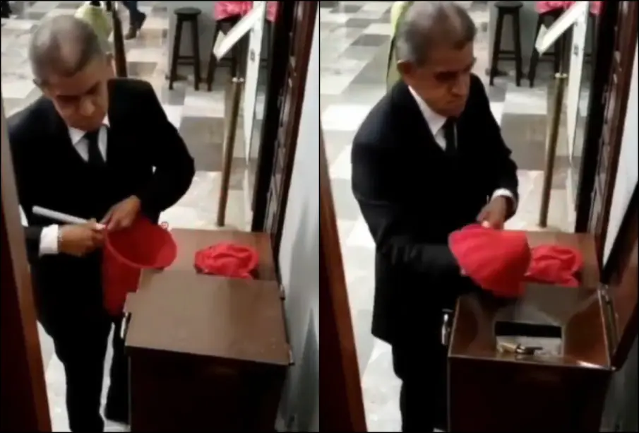 VIDEO exhibe a presunto trabajador robando limosnas en la Catedral de Puebla